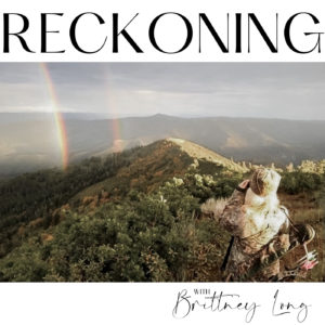 Reckoning Podcast Cover. Blonde female in camo with bow, overlooking mountain top with double rainbow.